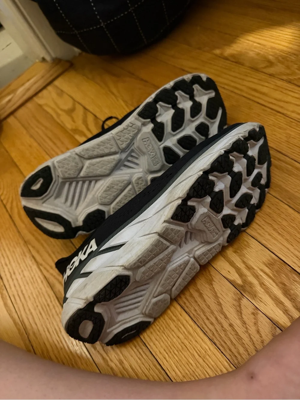 Hoka Black and White Cushioning Running Sneakers